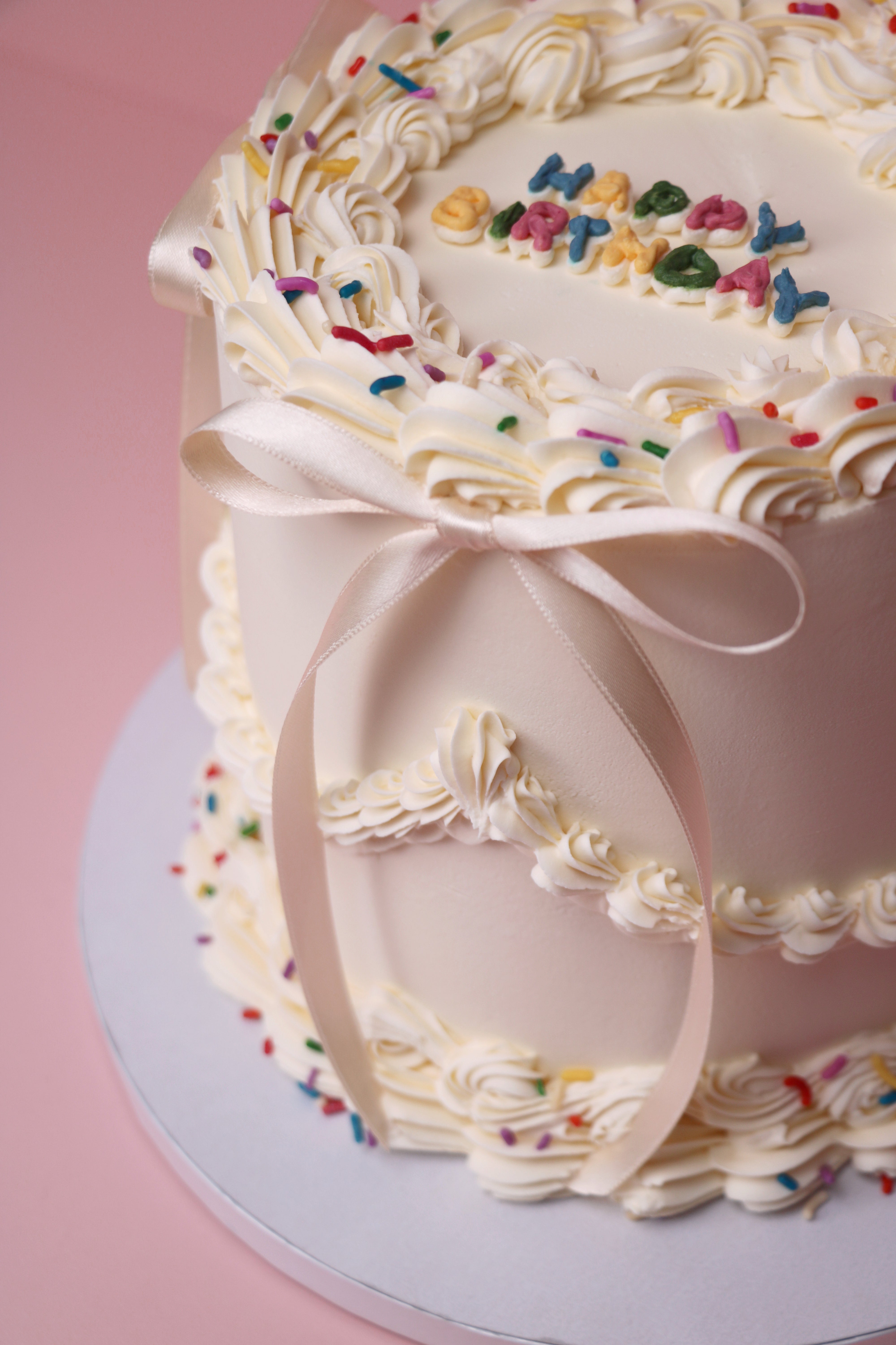 Retro Sprinkle Birthday Cake with Bows