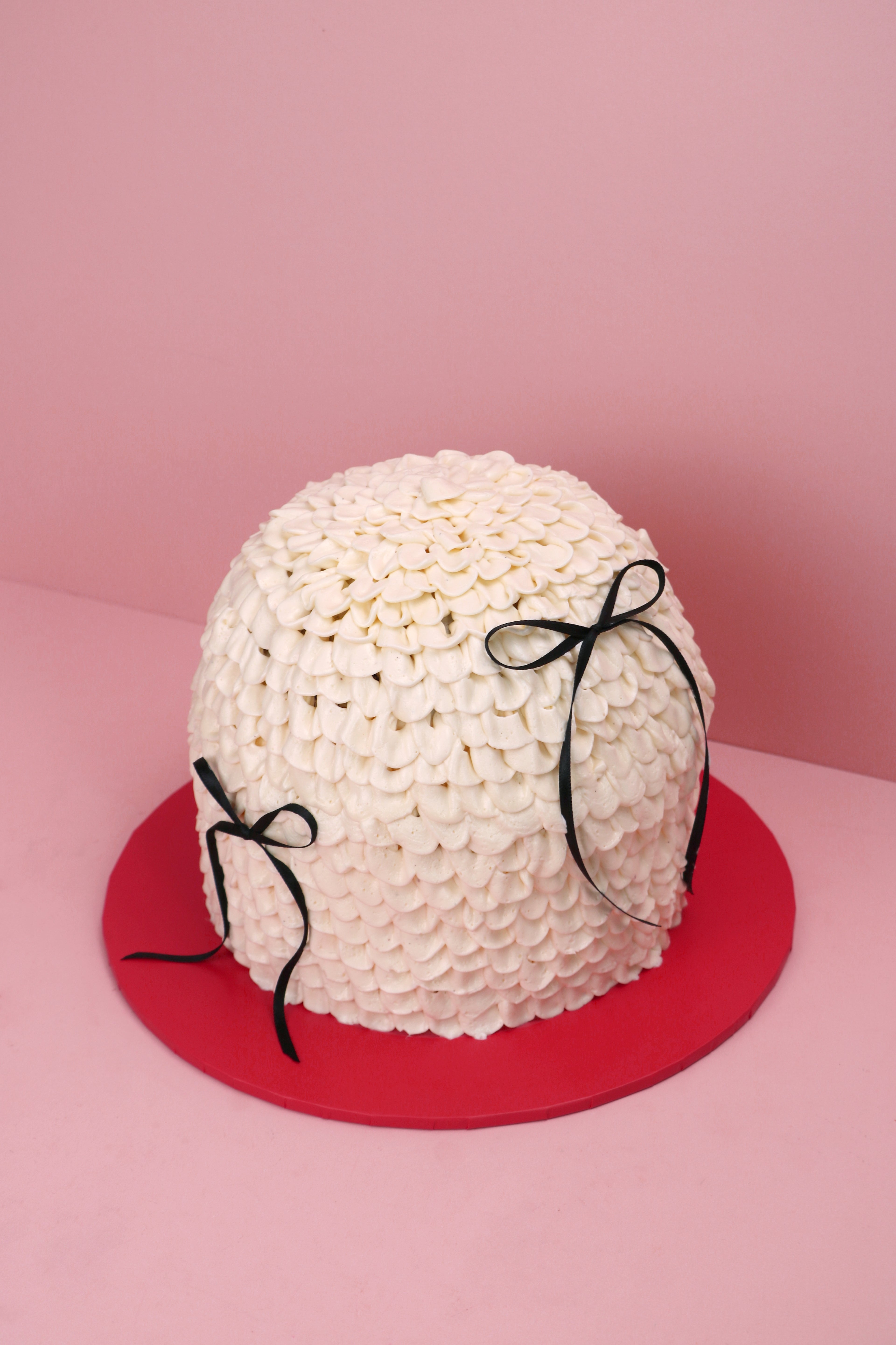 Dome-shaped vintage buttercream cake with ribbon – Cakeasion Uxbridge