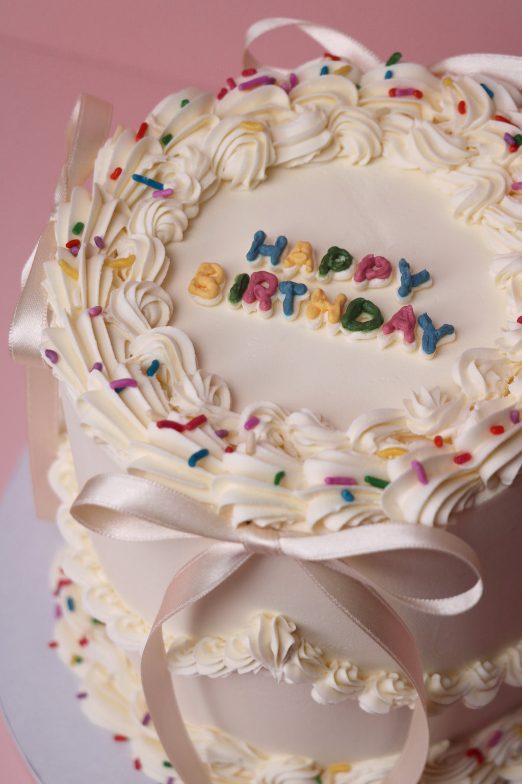 Retro Sprinkle Birthday Cake with Bows