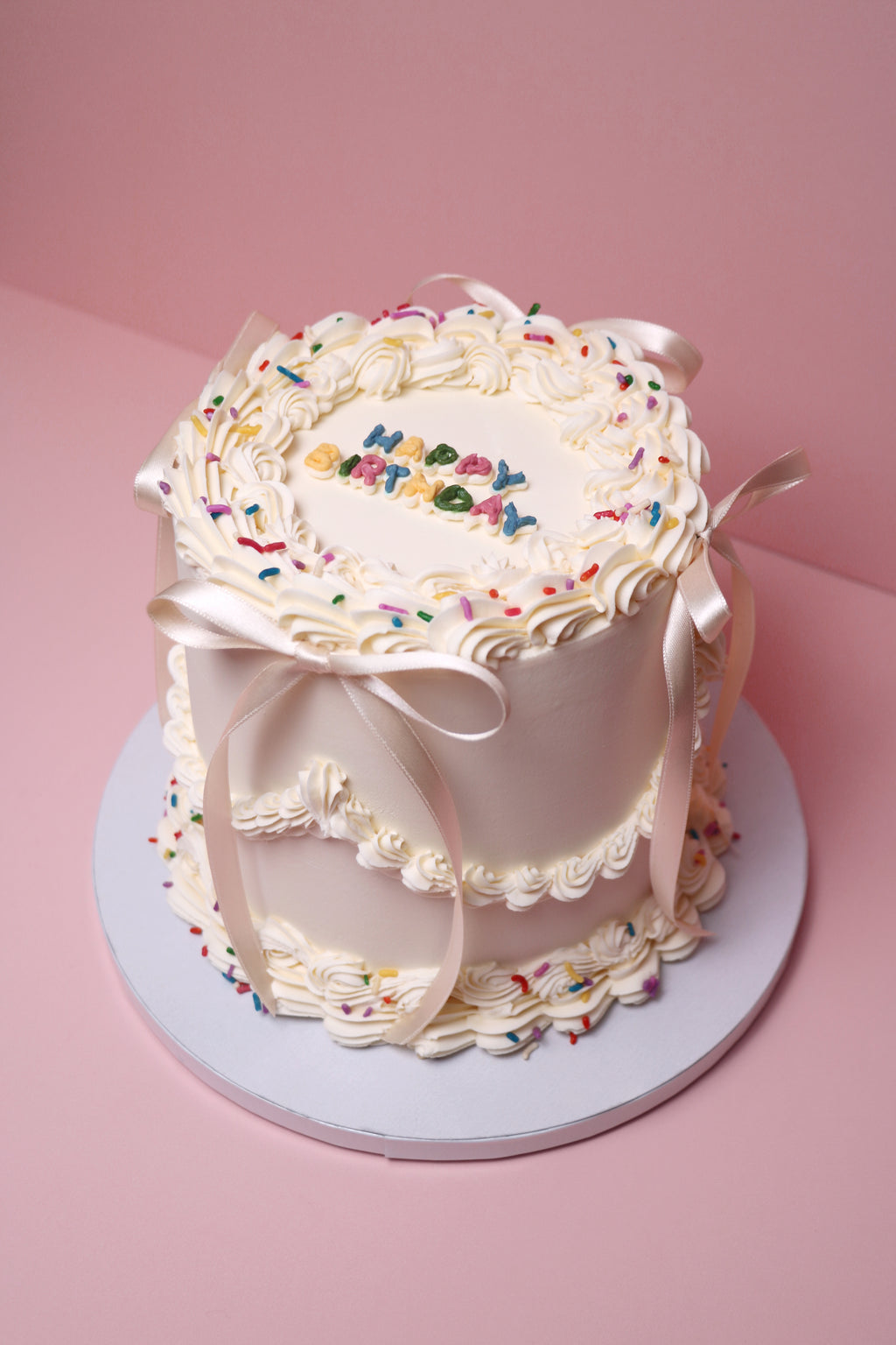 Retro Sprinkle Birthday Cake with Bows